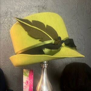 Stylish Green and Brown Hat with Feather Detail